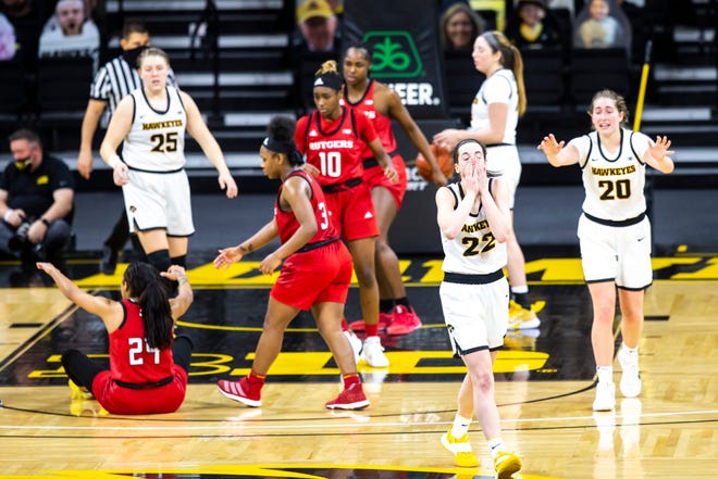 Iowa guard Caitlin Clark (22) reacts after drawing her fourth foul during a NCAA Big Ten Conference women's basketball game against Rutgers, Thursday, Dec. 31, 2020, at Carver-Hawkeye Arena in Iowa City, Iowa.