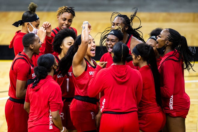 Rutgers guard Arella Guirantes huddles up with teamamtes before a NCAA Big Ten Conference women's basketball game against Iowa, Thursday, Dec. 31, 2020, at Carver-Hawkeye Arena in Iowa City, Iowa.