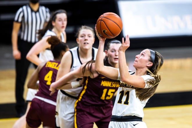 Iowa guard Megan Meyer (11) makes a basket during a NCAA Big Ten Conference women's basketball game against Minnesota, Wednesday, Jan. 6, 2021, at Carver-Hawkeye Arena in Iowa City, Iowa.