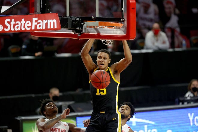 COLLEGE PARK, MARYLAND - JANUARY 07: Keegan Murray #15 of the Iowa Hawkeyes dunks the ball in the first half against the Maryland Terrapins at Xfinity Center on January 07, 2021 in College Park, Maryland.