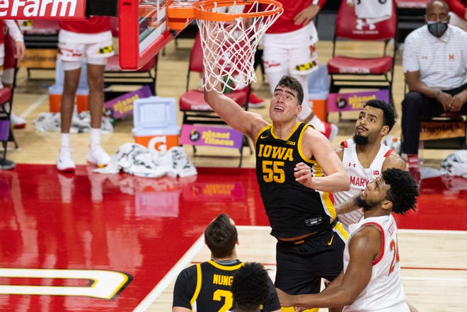 Iowa Hawkeyes center Luka Garza (55) shoots during the first half against the Maryland Terrapins on Jan. 7 at Xfinity Center in College Park, Maryland.
