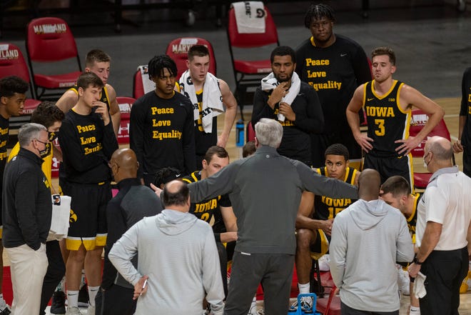 Iowa Hawkeyes head coach Fran McCaffery s[peaks with his team during a time out during the first half against the Maryland Terrapins on Jan. 7 at Xfinity Center in College Park, Maryland.