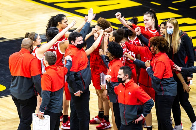 Ohio State head coach Kevin McGuff huddles with players during a NCAA Big Ten Conference women's basketball game, Wednesday, Jan. 13, 2021, at Carver-Hawkeye Arena in Iowa City, Iowa.