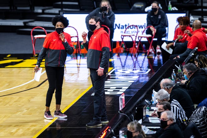 Ohio State head coach Kevin McGuff stands along the baseline with assistant coach Tamika Jeter during a NCAA Big Ten Conference women's basketball game, Wednesday, Jan. 13, 2021, at Carver-Hawkeye Arena in Iowa City, Iowa.