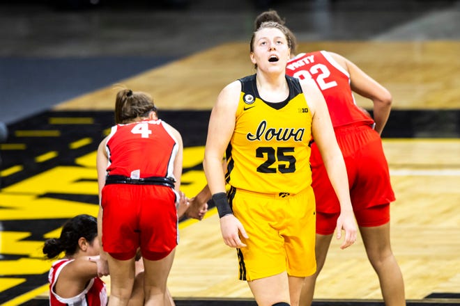 Iowa center Monika Czinano (25) reacts after fouling out in overtime during a NCAA Big Ten Conference women's basketball game against Ohio State, Wednesday, Jan. 13, 2021, at Carver-Hawkeye Arena in Iowa City, Iowa.