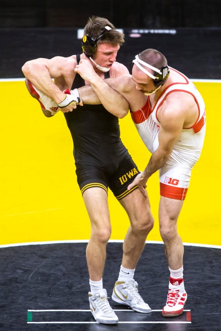 Iowa's Max Murin, left, wrestles Nebraska's Brock Hardy at 149 pounds during a NCAA Big Ten Conference wrestling dual, Friday, Jan. 15, 2021, at Carver-Hawkeye Arena in Iowa City, Iowa.