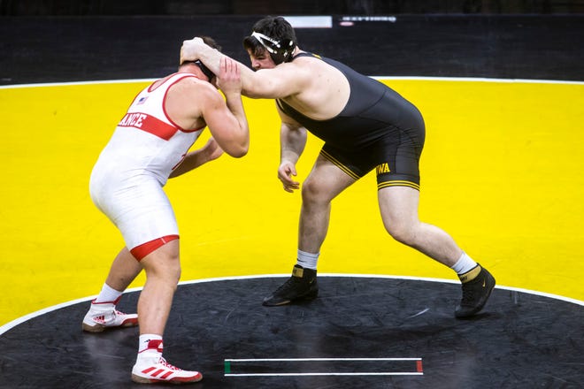Iowa's Tony Cassioppi, right, wrestles Nebraska's Christian Lance at 285 pounds during a NCAA Big Ten Conference wrestling dual, Friday, Jan. 15, 2021, at Carver-Hawkeye Arena in Iowa City, Iowa.