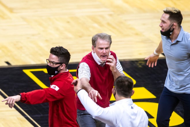 Nebraska head coach Mark Manning gestures to call a challenge during a NCAA Big Ten Conference wrestling dual, Friday, Jan. 15, 2021, at Carver-Hawkeye Arena in Iowa City, Iowa.