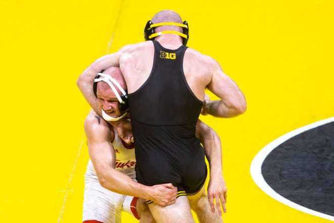 Nebraska's Peyton Robb, left, wrestles Iowa's Alex Marinelli at 165 pounds during a NCAA Big Ten Conference wrestling dual, Friday, Jan. 15, 2021, at Carver-Hawkeye Arena in Iowa City, Iowa.