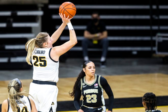 Iowa center Monika Czinano (25) makes a basket during a NCAA Big Ten Conference women's basketball game against Purdue, Monday, Jan. 18, 2021, at Carver-Hawkeye Arena in Iowa City, Iowa.
