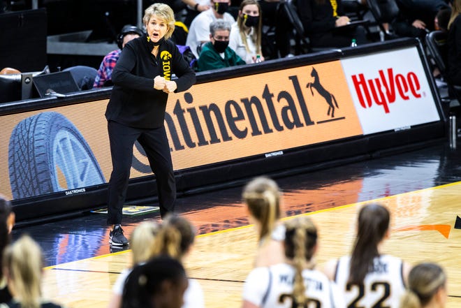 Iowa head coach Lisa Bluder calls out to players during a NCAA Big Ten Conference women's basketball game against Purdue, Monday, Jan. 18, 2021, at Carver-Hawkeye Arena in Iowa City, Iowa.