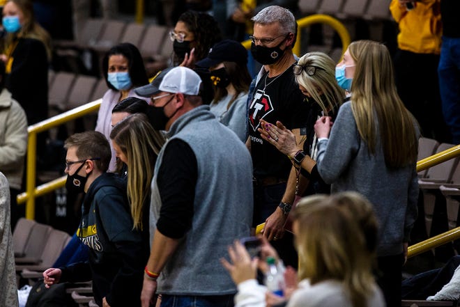 The family of Tate Schaefer, of Williamsburg, are acknowledged by fans and players after a NCAA Big Ten Conference men's basketball game against Penn State, Sunday, Feb. 21, 2021, at Carver-Hawkeye Arena in Iowa City, Iowa.