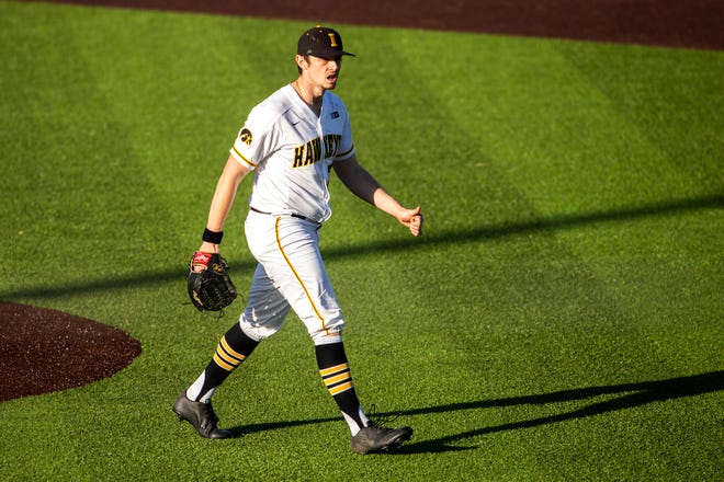 Iowa pitcher Trenton Wallace reacts after a strikeout during a NCAA Big Ten Conference baseball game against Nebraska, Friday, March 19, 2021, at Duane Banks Field in Iowa City, Iowa.