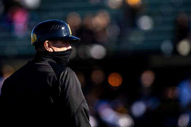 Iowa head coach Rick Heller looks on during a NCAA Big Ten Conference baseball game against Nebraska, Friday, March 19, 2021, at Duane Banks Field in Iowa City, Iowa.