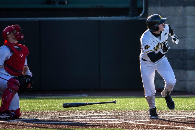 Iowa's Brendan Sher watches as he hits a home run during a NCAA Big Ten Conference baseball game against Nebraska, Friday, March 19, 2021, at Duane Banks Field in Iowa City, Iowa.