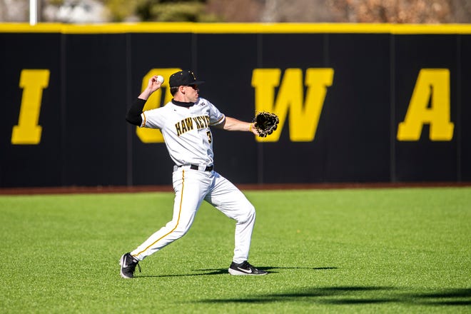 Iowa's Sam Link (3) fields a ball during a NCAA Big Ten Conference baseball game against Nebraska, Friday, March 19, 2021, at Duane Banks Field in Iowa City, Iowa.