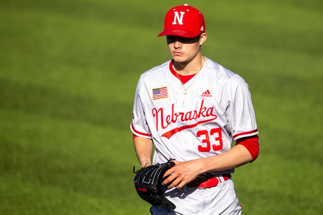 Nebraska pitcher Cade Povich walks to the dugout during a NCAA Big Ten Conference baseball game against Iowa, Friday, March 19, 2021, at Duane Banks Field in Iowa City, Iowa.