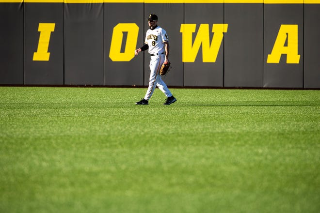 Iowa's Ben Norman (9) stands in center field during a NCAA Big Ten Conference baseball game against Nebraska, Friday, March 19, 2021, at Duane Banks Field in Iowa City, Iowa.