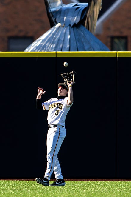 Iowa's Sam Link (3) gets an out during a NCAA Big Ten Conference baseball game against Nebraska, Friday, March 19, 2021, at Duane Banks Field in Iowa City, Iowa.