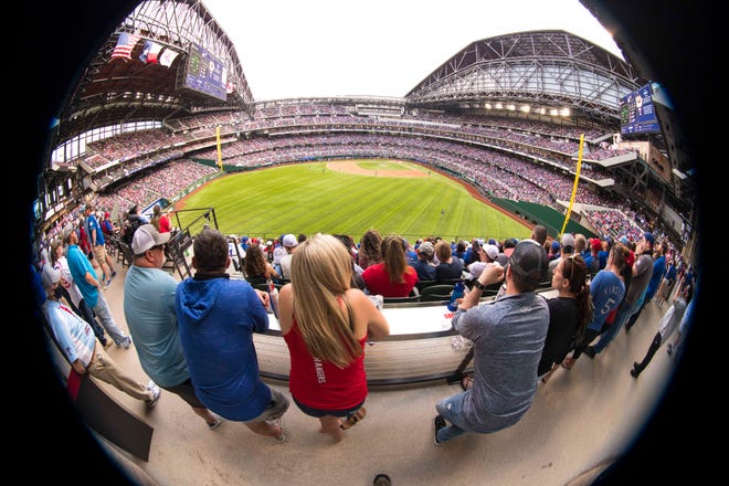 A view of the fans in the outfield party deck during the game between the Rangers and Blue Jays at Globe Life Field.