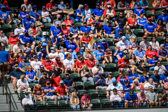 A view of the fans and the stands during the first inning of the Blue Jays-Rangers game.