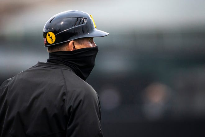 Iowa head coach Rick Heller looks on from the third baseline during a NCAA Big Ten Conference baseball game against Minnesota, Friday, April 9, 2021, at Duane Banks Field in Iowa City, Iowa.