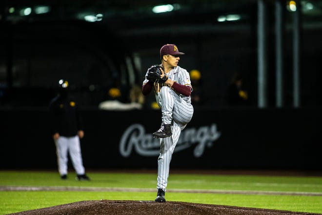 Minnesota's Drake Davis (3) delivers a pitch during a NCAA Big Ten Conference baseball game against Iowa, Friday, April 9, 2021, at Duane Banks Field in Iowa City, Iowa.