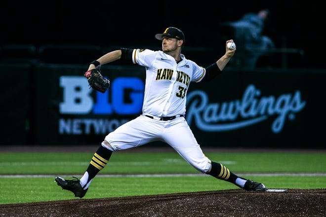 Iowa's Trenton Wallace (38) delivers a pitch during a NCAA Big Ten Conference baseball game, Friday, April 9, 2021, at Duane Banks Field in Iowa City, Iowa.