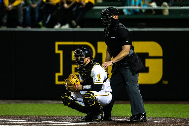 Iowa's Austin Martin (34) catches during a NCAA Big Ten Conference baseball game against Minnesota, Friday, April 9, 2021, at Duane Banks Field in Iowa City, Iowa.