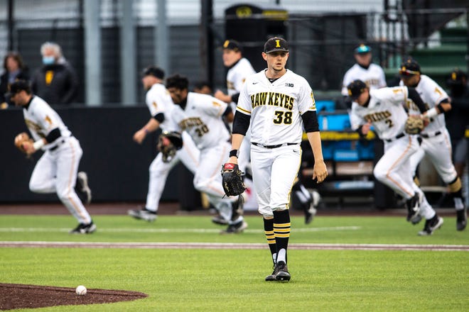 Iowa's Trenton Wallace (38) walks out to the mound during a NCAA Big Ten Conference baseball game against Minnesota, Friday, April 9, 2021, at Duane Banks Field in Iowa City, Iowa.