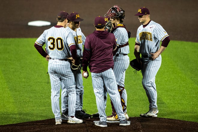 Minnesota's Drake Davis walks up onto the mound as a relief pitcher during a NCAA Big Ten Conference baseball game against Iowa, Friday, April 9, 2021, at Duane Banks Field in Iowa City, Iowa.