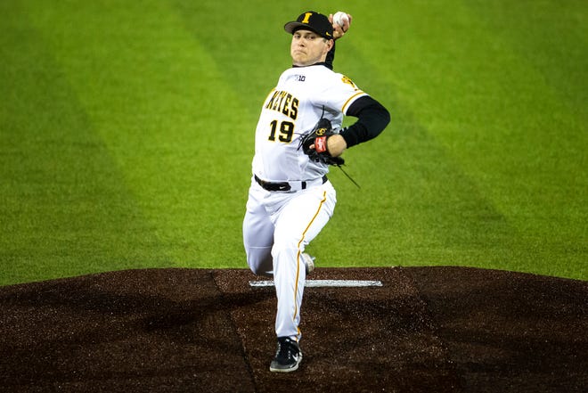 Iowa's Ben Probst (19) delivers a pitch during a NCAA Big Ten Conference baseball game against Minnesota, Friday, April 9, 2021, at Duane Banks Field in Iowa City, Iowa.
