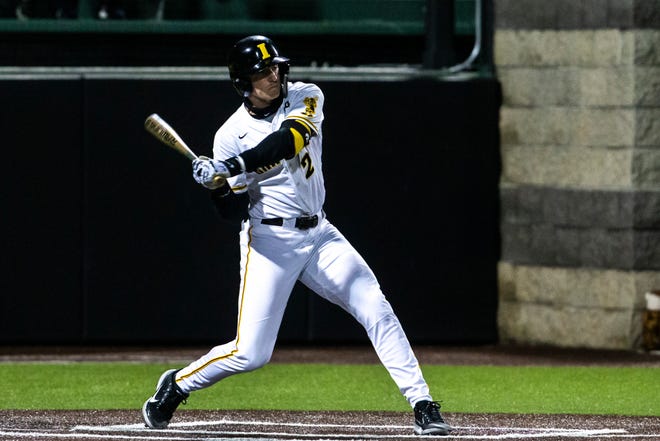 Iowa's Brendan Sher (2) bats during a NCAA Big Ten Conference baseball game against Minnesota, Friday, April 9, 2021, at Duane Banks Field in Iowa City, Iowa.