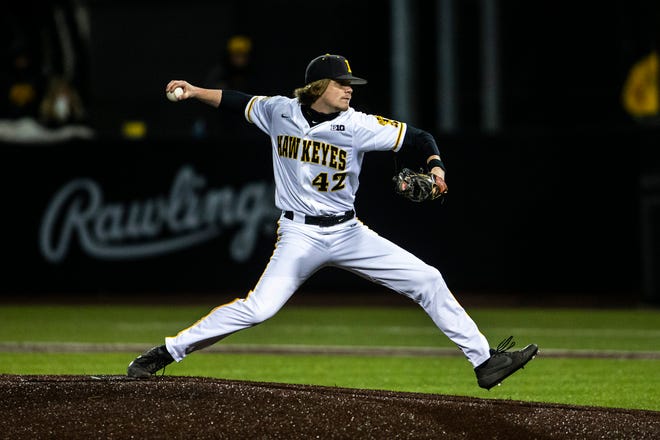 Iowa's Trace Hoffman (42) delivers a pitch during a NCAA Big Ten Conference baseball game against Minnesota, Friday, April 9, 2021, at Duane Banks Field in Iowa City, Iowa.