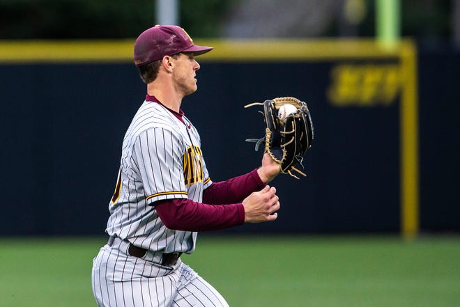 Minnesota's Jack Wassel (30) catches an out during a NCAA Big Ten Conference baseball game against Iowa, Friday, April 9, 2021, at Duane Banks Field in Iowa City, Iowa.