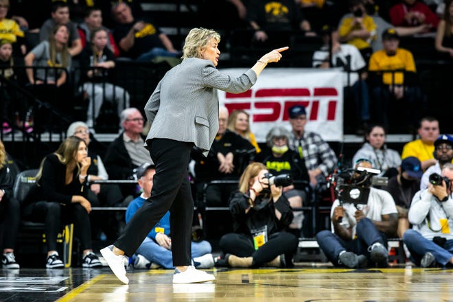 Iowa head coach Lisa Bluder reacts during a NCAA Big Ten Conference women's basketball game against Michigian, Sunday, Feb. 27, 2022, at Carver-Hawkeye Arena in Iowa City, Iowa.
