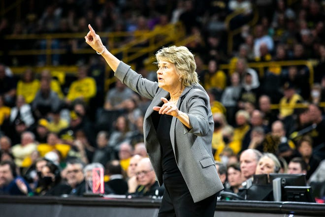 Iowa head coach Lisa Bluder reacts during a NCAA Big Ten Conference women's basketball game against Michigan, Sunday, Feb. 27, 2022, at Carver-Hawkeye Arena in Iowa City, Iowa.