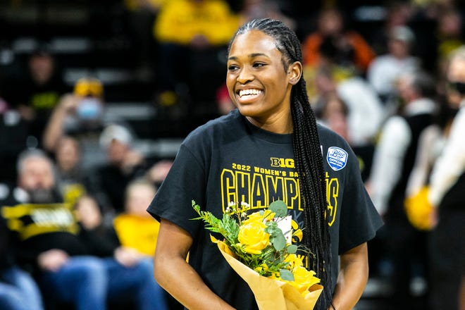 Iowa guard Tomi Taiwo smiles after a NCAA Big Ten Conference women's basketball game against Michigan, Sunday, Feb. 27, 2022, at Carver-Hawkeye Arena in Iowa City, Iowa.