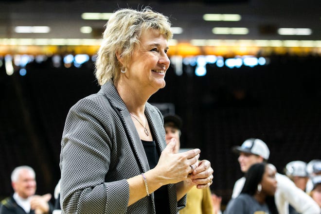 Iowa head coach Lisa Bluder celebrates after a NCAA Big Ten Conference women's basketball game against Michigan, Sunday, Feb. 27, 2022, at Carver-Hawkeye Arena in Iowa City, Iowa.