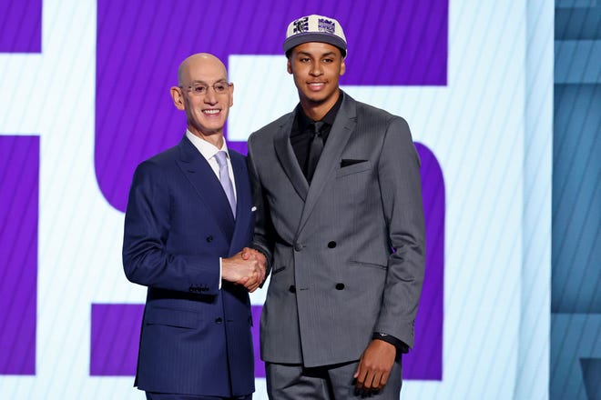Jun 23, 2022; Brooklyn, NY, USA; Keegan Murray (Iowa) shakes hands with NBA commissioner Adam Silver after being selected as the number four overall pick by the Sacramento Kings in the first round of the 2022 NBA Draft at Barclays Center. Mandatory Credit: Brad Penner-USA TODAY Sports