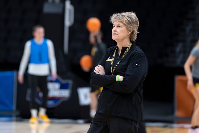 Iowa Hawkeyes head coach Lisa Bluder watches practice at Climate Pledge Arena on Thursday, March 23, 2023 in Seattle.
